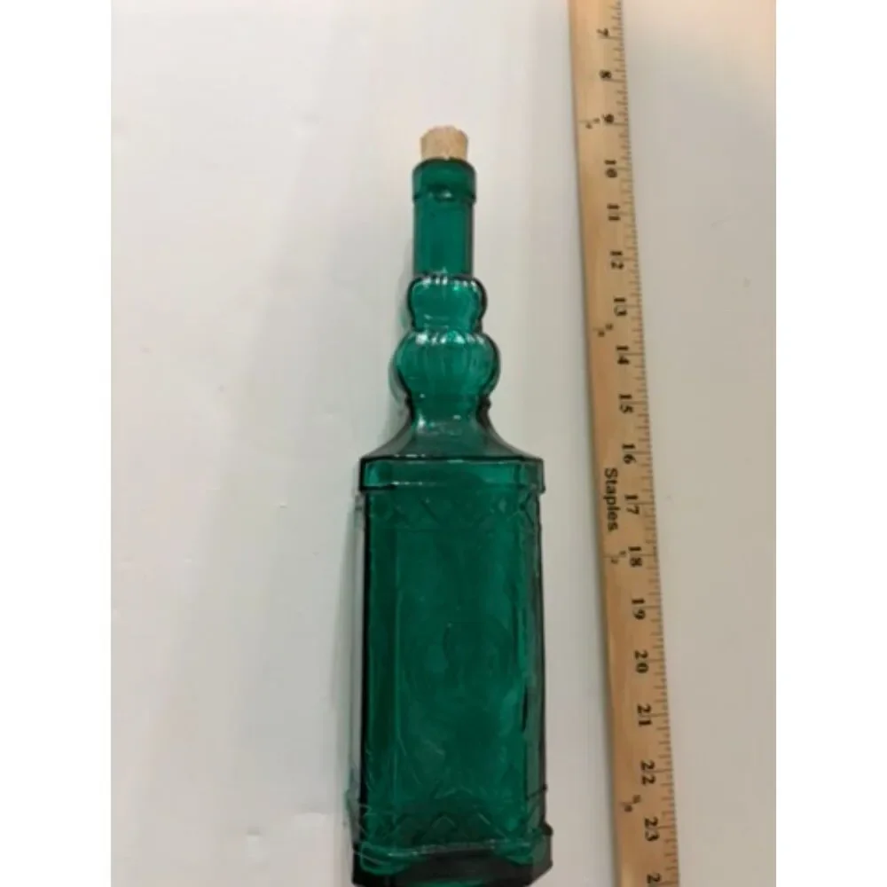 vtg emerald green glass decanter bottle with embossed sides and cork stopper